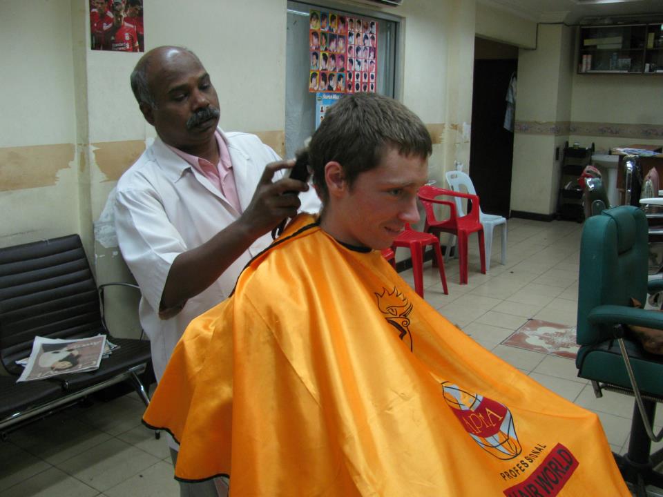 You might nervously go to a $5.00 barber in little India.